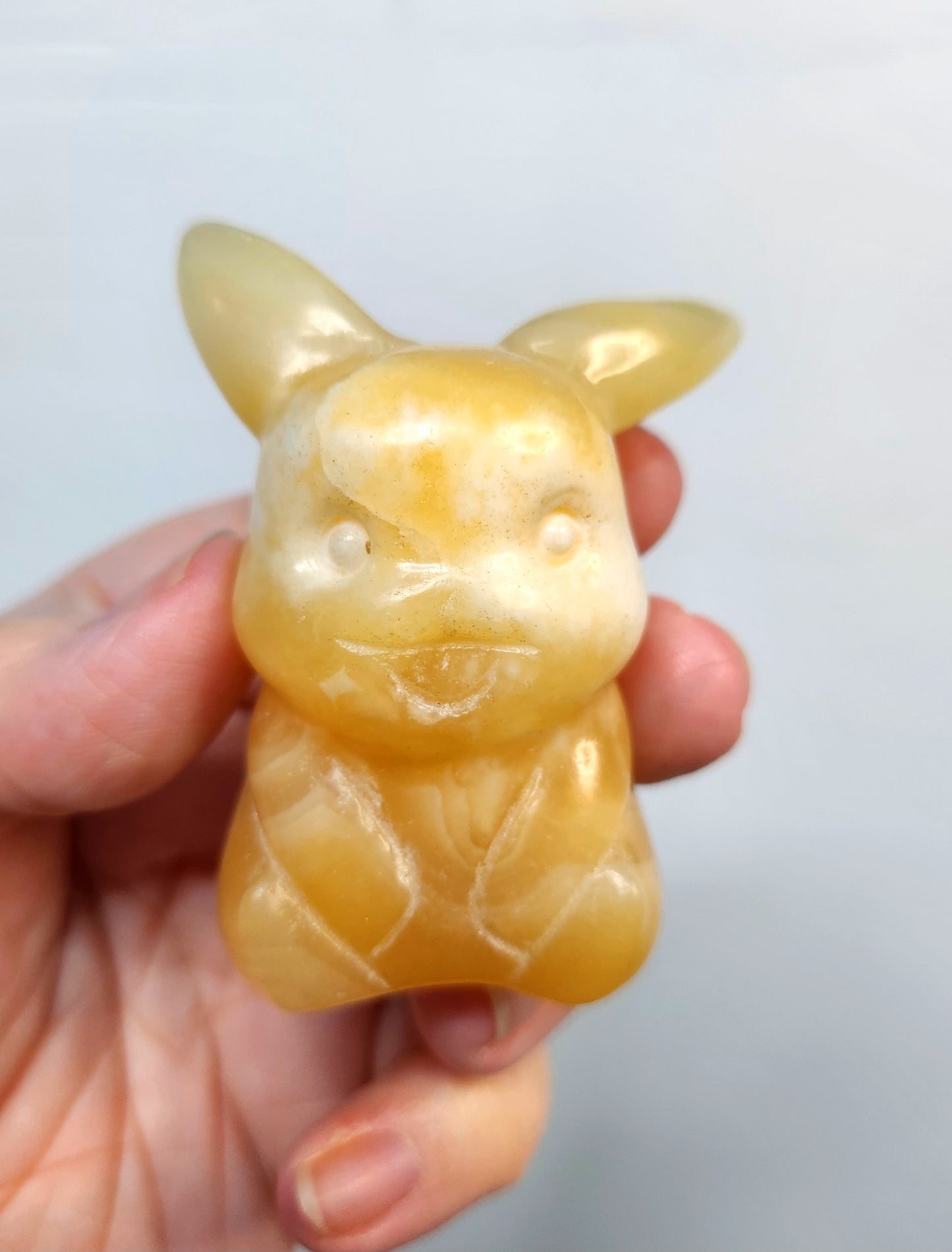 Orange Calcite Pikachu Crystal Carving